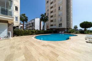 a swimming pool in the middle of a building at Apartment with Shared Pool in Antalya in Antalya