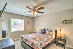 a bedroom with a bed and a ceiling fan at Stylish and Central Mesa Home with Private Pool! in Mesa