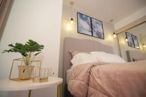 Ένα ή περισσότερα κρεβάτια σε δωμάτιο στο Apartamento Edificio Portofino 701