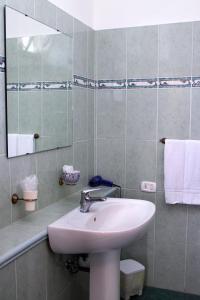 Koupelna v ubytování B&B Darsena + 29 fotografií