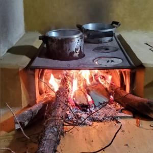 Kjøkken eller kjøkkenkrok på IVOS Hostel & Camping