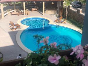 Bazén v ubytování Saint George Hotel - Spa & Temazcal nebo v jeho okolí