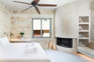 Posteľ alebo postele v izbe v ubytovaní Inotropes Boutique Suites - Adults Only