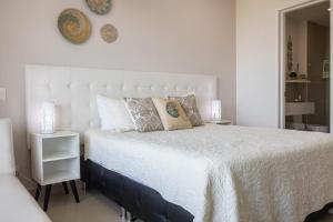 Ένα ή περισσότερα κρεβάτια σε δωμάτιο στο Apto en Morros Epic Cartagena