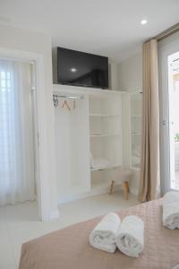 Postel nebo postele na pokoji v ubytování B&B Toci