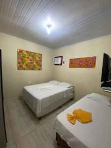 Postel nebo postele na pokoji v ubytování FLATS VASCONCELOS