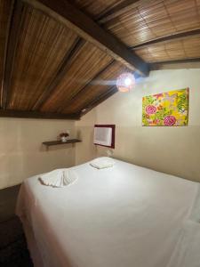 Postel nebo postele na pokoji v ubytování FLATS VASCONCELOS