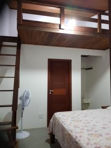 Postel nebo postele na pokoji v ubytování Morere Jungle Lodge