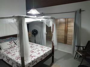 Postel nebo postele na pokoji v ubytování Morere Jungle Lodge