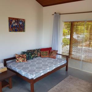 Postel nebo postele na pokoji v ubytování Morere Jungle Lodge