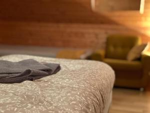 A bed or beds in a room at Apartmán na hranici