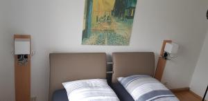 A bed or beds in a room at Ferienwohnung klein Treben