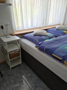 Postel nebo postele na pokoji v ubytování Apartment für zwei + 28 fotografií