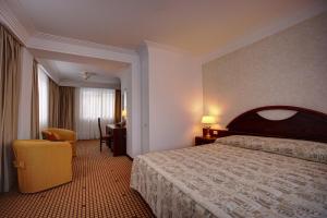 Un pat sau paturi într-o cameră la Hotel Citrin - Adults Only +15 fotografii