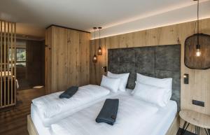 A bed or beds in a room at AhriaPura