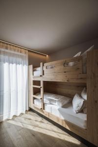 A bed or beds in a room at AhriaPura