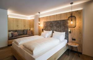 A bed or beds in a room at AhriaPura