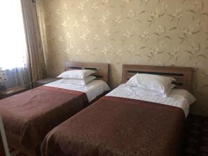 Posteľ alebo postele v izbe v ubytovaní Hello Dushanbe Guest House