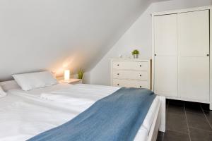 Ένα ή περισσότερα κρεβάτια σε δωμάτιο στο Residenz 3