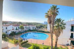 a view of a swimming pool from a apartment at PUERTAS AL MAR in Cala en Blanes