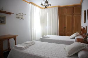 Postel nebo postele na pokoji v ubytování Villa Rural Paquete + 36 fotografií