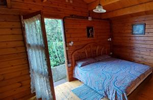 Posteľ alebo postele v izbe v ubytovaní Casa Canarina