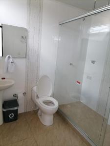Koupelna v ubytování Hotel Cayapo