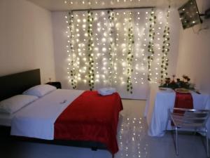 Postel nebo postele na pokoji v ubytování Hotel Cayapo
