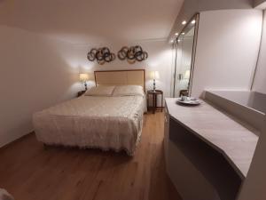 A bed or beds in a room at Navona Best House