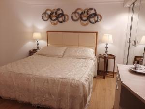 A bed or beds in a room at Navona Best House