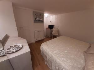 A bed or beds in a room at Navona Best House