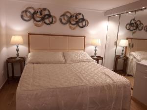 A bed or beds in a room at Navona Best House