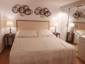 A bed or beds in a room at Navona Best House