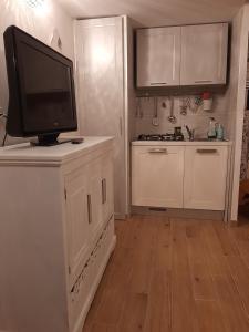 A kitchen or kitchenette at Navona Best House