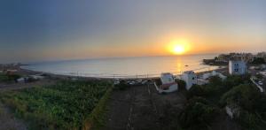 an aerial view of a beach at sunset at Casa Domingo in Valle Gran Rey