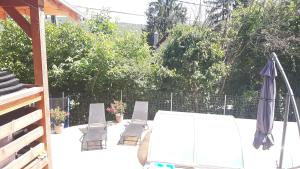 Un balcón o terraza de Onix- Kis-tó Apartman ORFŰ