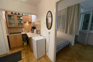 Kuchyňa alebo kuchynka v ubytovaní Super Apartament SAWA 2 Metro WiFi 500 mbs TV'50 Netflix HBO AppleTV+