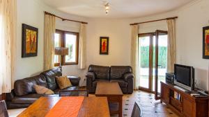 Posezení v ubytování Villa El Palmar