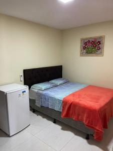 Cama o camas de una habitación en Pousada Mirante do Cunhaú