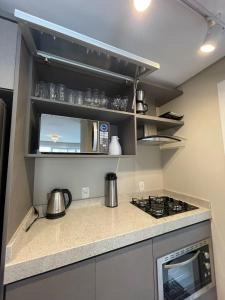 Nhà bếp/bếp nhỏ tại Apartamento Luz da Aurora - Próximo a Rua Coberta