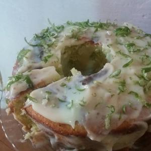 a donut with cheese and green onions on a plate at Hospedaria Estrada Real in Tiradentes