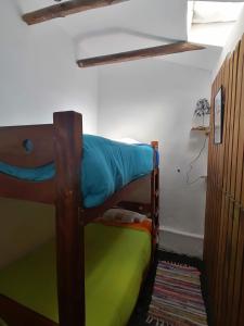 Letto o letti in una camera di Asiriq Wasi Guest House