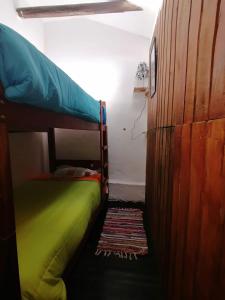 Letto o letti in una camera di Asiriq Wasi Guest House