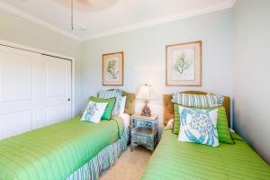 Säng eller sängar i ett rum på Perdido Key Villa by the Sea
