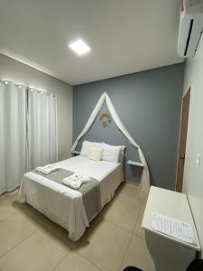 Cama ou camas em um quarto em Ventanas Hotel Boutique