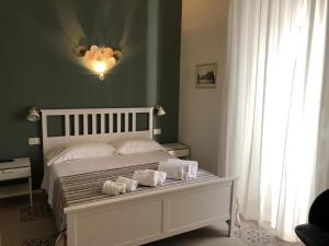 Postel nebo postele na pokoji v ubytování Ursino's Luxury