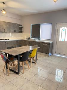 A kitchen or kitchenette at Nafplio Boutique Apartment Még 17 kép