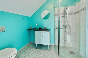Holberggaard Apartments tesisinde bir banyo