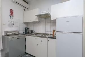 Kuchyň nebo kuchyňský kout v ubytování Apartments Porto Duce