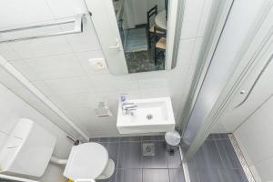 Koupelna v ubytování Apartments Porto Duce